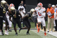 Clemson wide receiver Antonio Williams (0) runs for a long gain against Wake Forest during the second half of an NCAA college football game in Winston-Salem, N.C., Saturday, Sept. 24, 2022. (AP Photo/Chuck Burton)