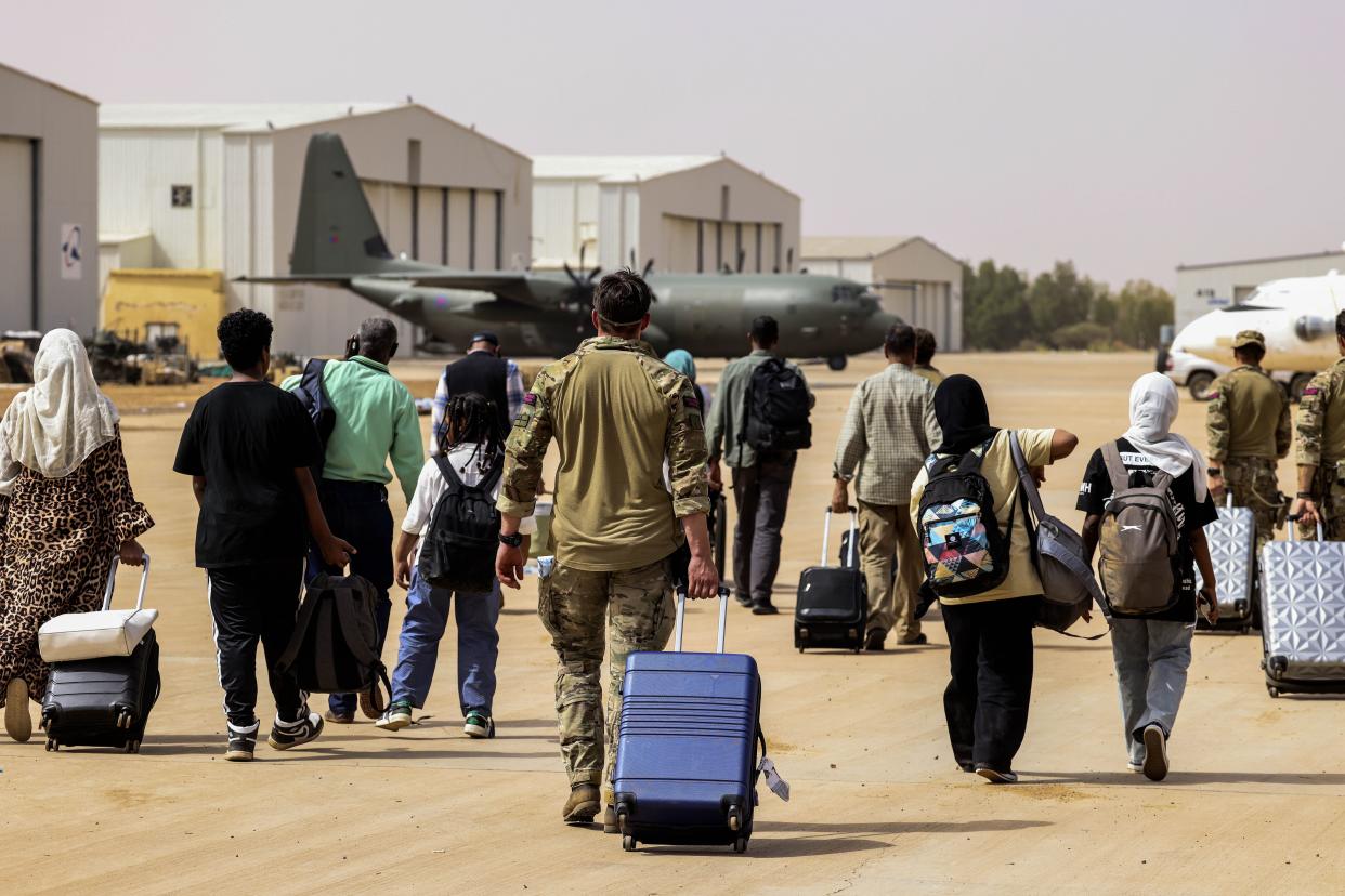 The evacuation of British Nationals onto an awaiting RAF aircraft at Wadi Saeedna Air Base in Khartoum (Ministry of Defence/PA) (PA Media)