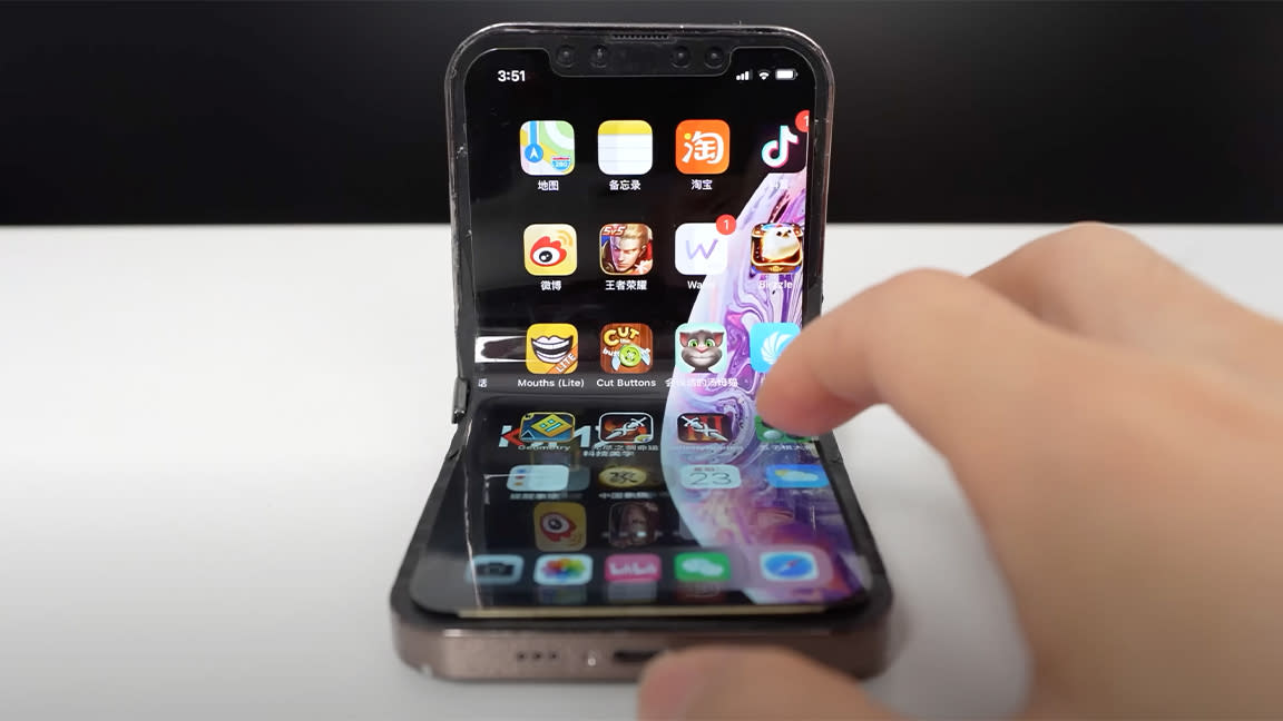  A video screen grab of a folding iPhone made by a fan. 