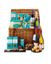 <p>This super-indulgent Exquisite hamper features hand-picked treats from Aldi’s premium Exquisite range, from wines and champagne to sweet and savoury favourites. It costs £99.99. Included are the obligatory luxury Christmas pudding and mince pies, two bottles of red wine, a bottle of white and a bottle of Champagne. </p>