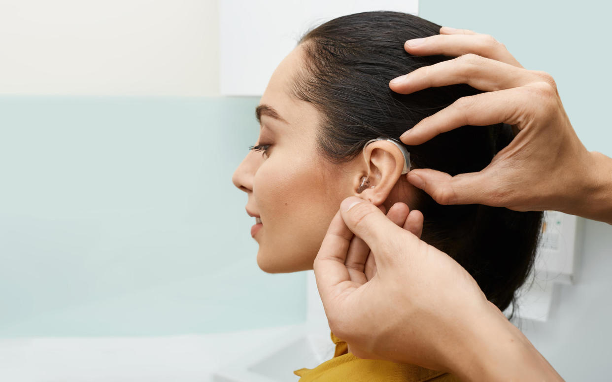 Hearing aids are now for sale for a few hundred dollars over the counter. Here are three ways to find cost-effective and reliable devices. / Credit: Getty Images/iStockphoto