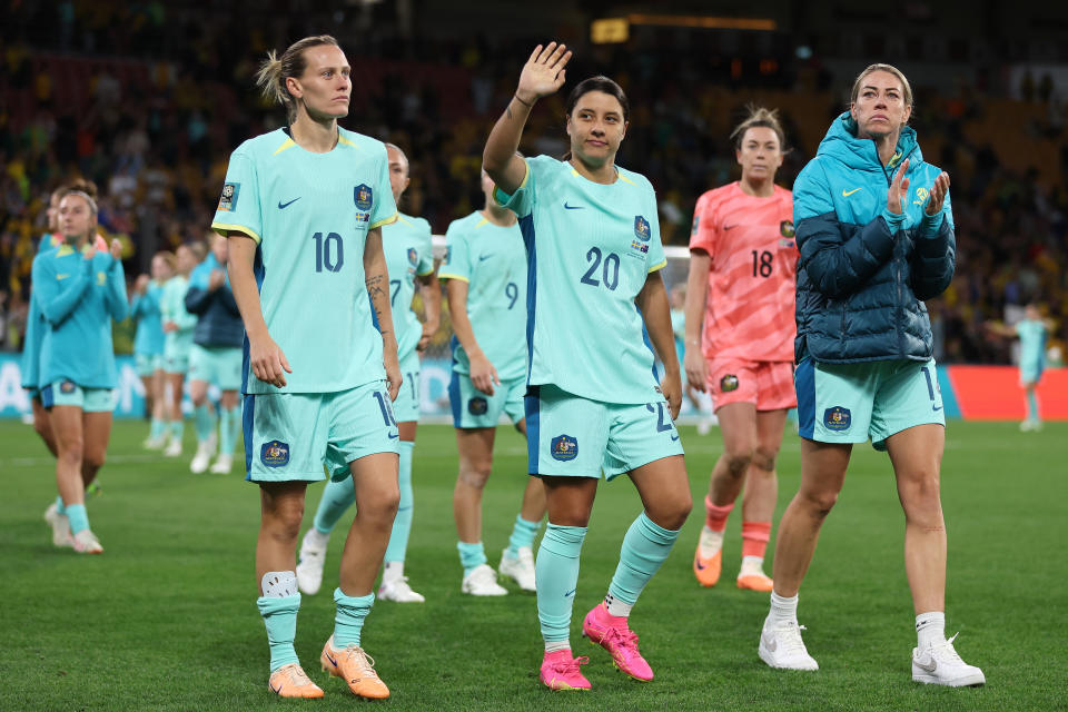 Sam Kerr waves to the fans.