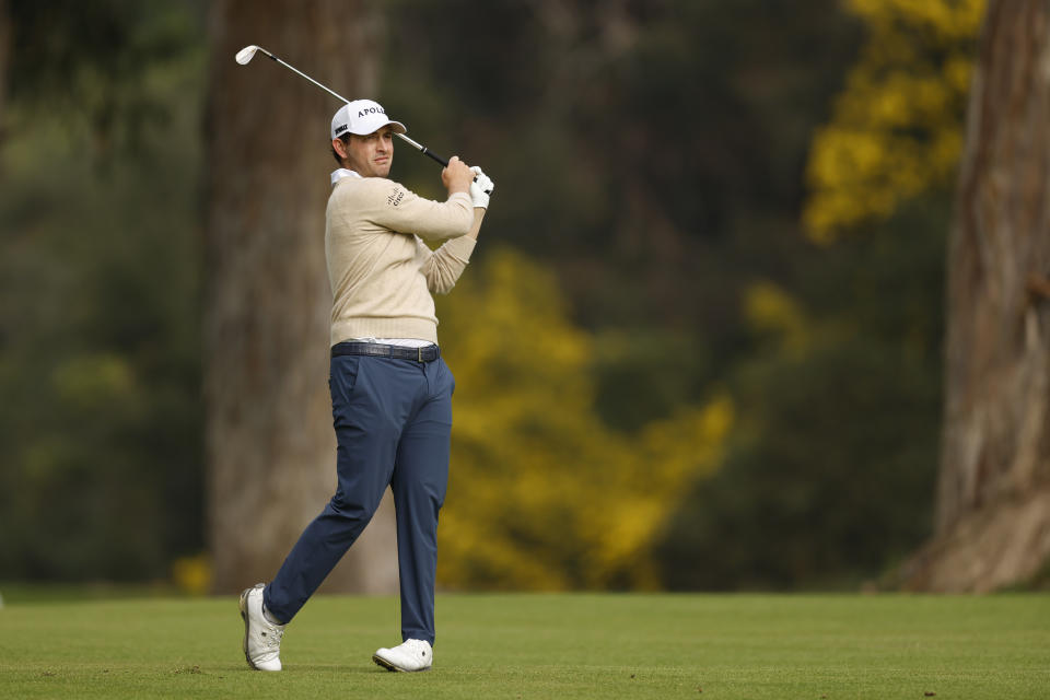 Patrick Cantlay hits from the fairway on the 13th hole during the third round of the Genesis Invitational golf tournament at Riviera Country Club, Saturday, Feb. 17, 2024, in the Pacific Palisades area of Los Angeles. (AP Photo/Ryan Kang)