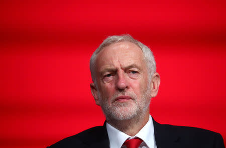 Britain's Labour Party Leader Jeremy Corbyn sits on stage at the annual Labour Party Conference in Liverpool, Britain, September 23, 2018. REUTERS/Hannah McKay