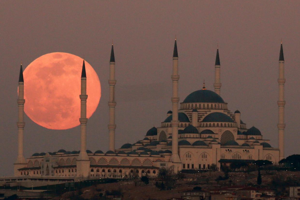 The full moon rises over the sky in Istanbul, with the Camlica Mosque, the largest mosque in Asia Minor on March 28, 2021, in an AP file photo. MU professor Eric Sandvol will meet up with other researchers deploying hundreds of small earthquake sensors in the earthquake zone for a National Science Foundation project.