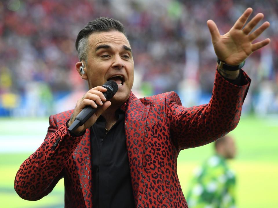 Robbie Williams 'dressed as Robert Plant and blasted Led Zeppelin rivals to annoy neighbour Jimmy Page'