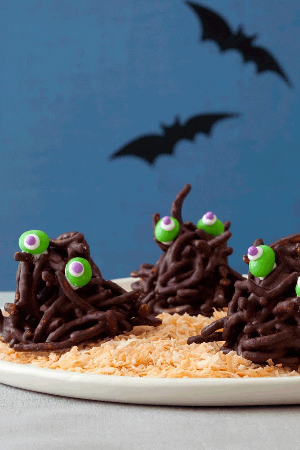 <p>Chow mein noodles are the secret to these creepy monsters.</p><p><em><a href="https://www.womansday.com/food-recipes/food-drinks/recipes/a11427/haystack-creatures-recipe-122706/" rel="nofollow noopener" target="_blank" data-ylk="slk:Get the recipe from Woman's Day »;elm:context_link;itc:0;sec:content-canvas" class="link ">Get the recipe from Woman's Day »</a></em></p>