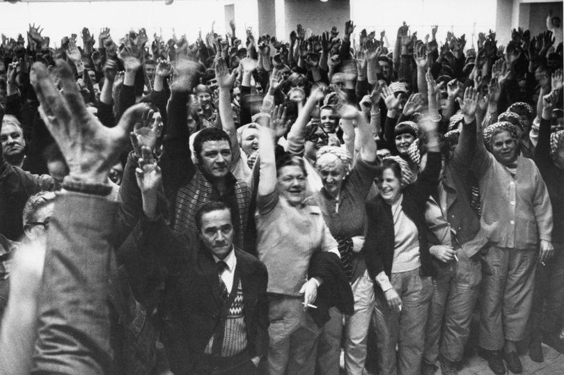 Tate and Lyle workers seen here at a mass meeting, vote to fight the closure of the refinery. January 23, 1981