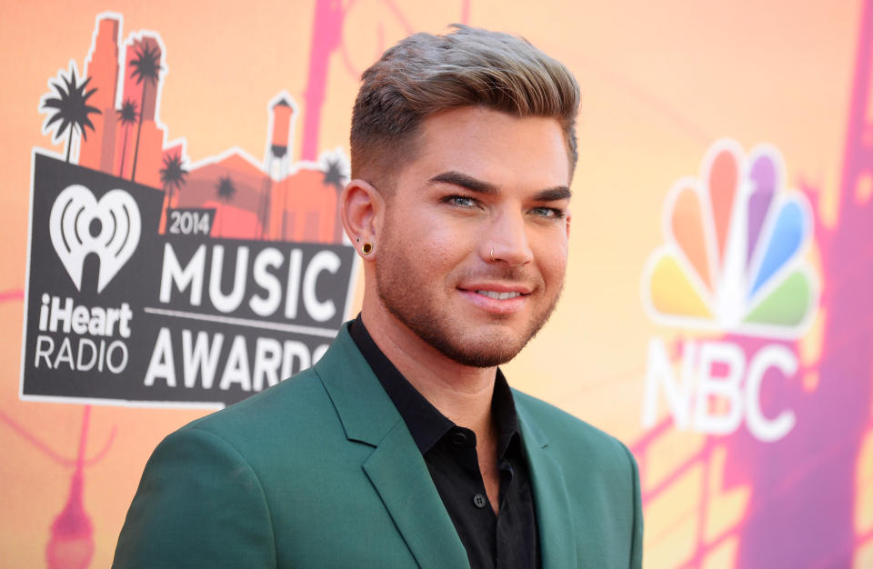 Adam Lambert arrives at the iHeartRadio Music Awards at the Shrine Auditorium on Thursday, May 1, 2014, in Los Angeles. (Photo by Jordan Strauss/Invision/AP)