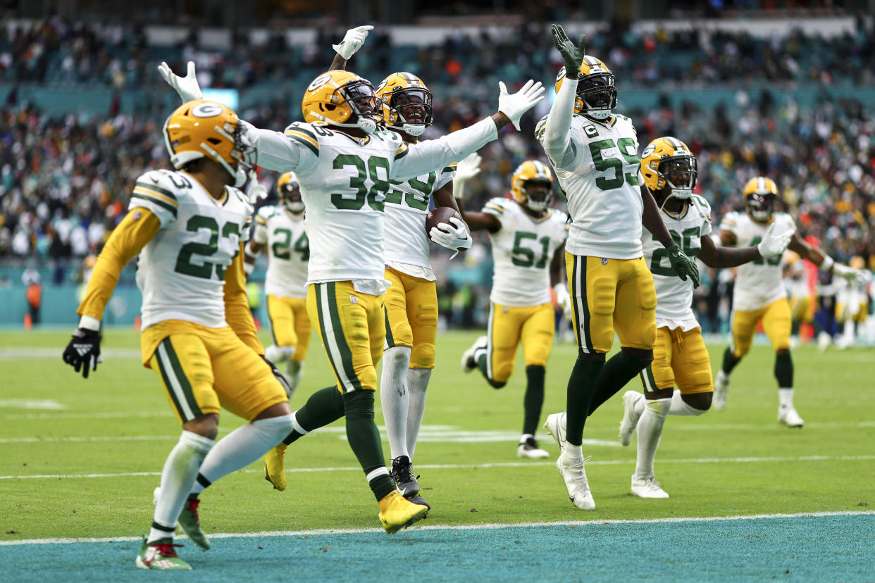 Green Bay's Rasul Douglas (29) celebrates with teammates after intercepting a pass during the fourth quarter. (Photo by Kevin Sabitus/Getty Images)