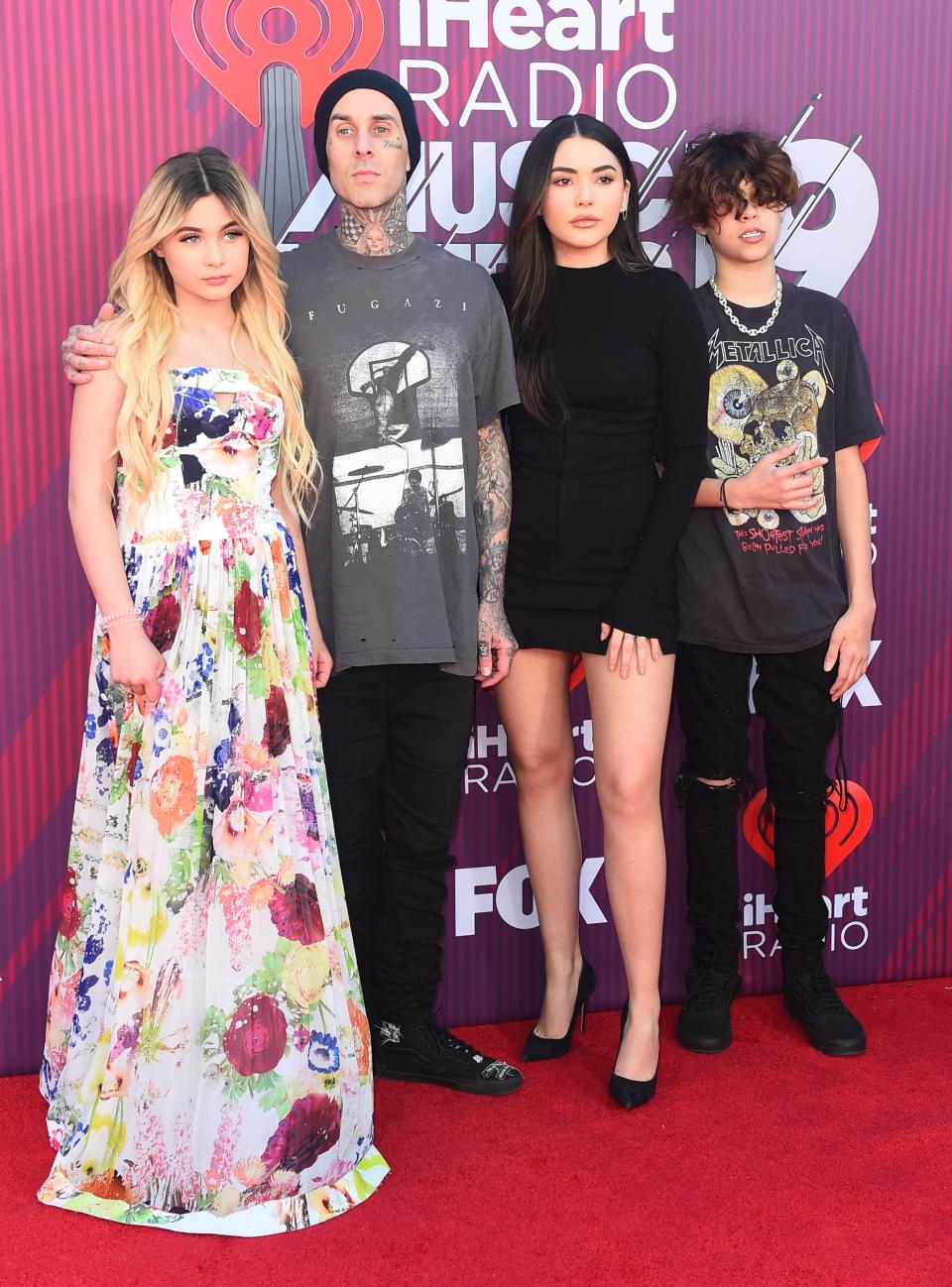 Alabama Luella Barker and her dad, Blink-182 drummer Travis Barker, at the iHeartRadio Music Awards on March 14, 2019, in Los Angeles.