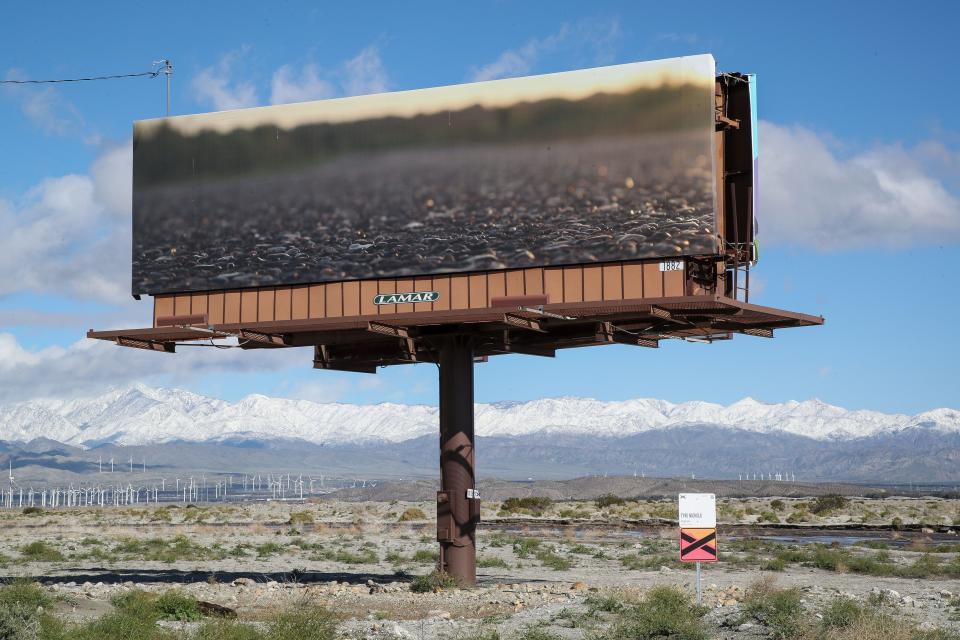 A series of billboards with photographs by Tyre Nichols display his artwork along Gene Autry Trail in Palm Springs, Calif., March 22, 2023. The billboards were part of the 2023 Desert X art exhibition.