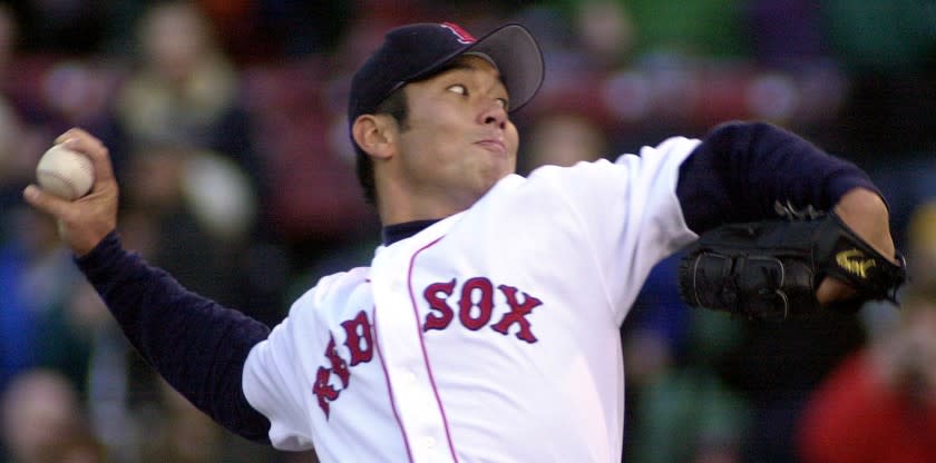 Boston Red Sox pitcher Hideo Nomo delivers in the