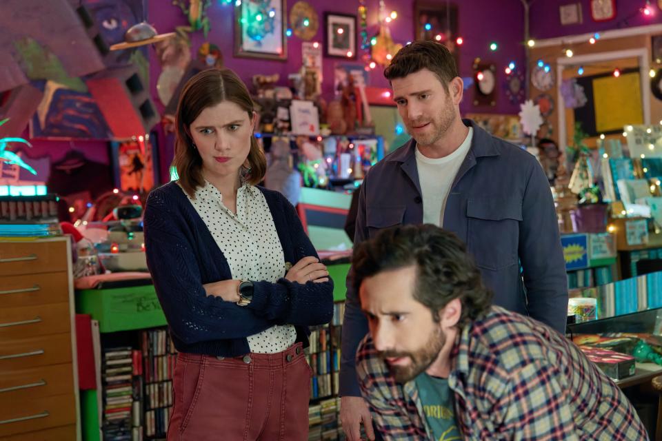 Rachel (Vic Michaelis) and Zach (Bryan Greenberg) search for an escape from the time loop with the help of comic book shop owner Seth (Amitai Marmorstein).