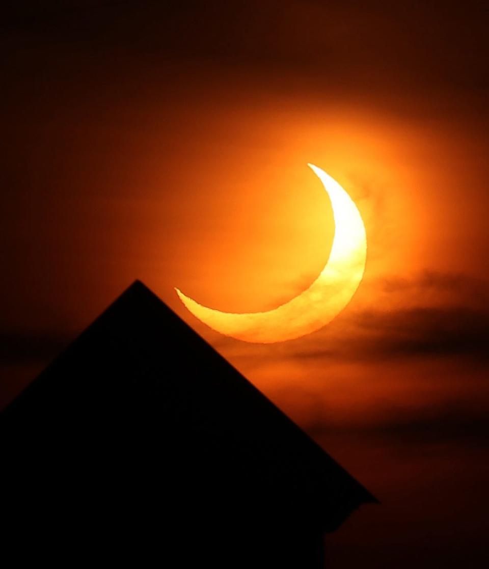 The ring of fire solar eclipse as seen from the Home Depot shopping center in Brewster June 10, 2021.