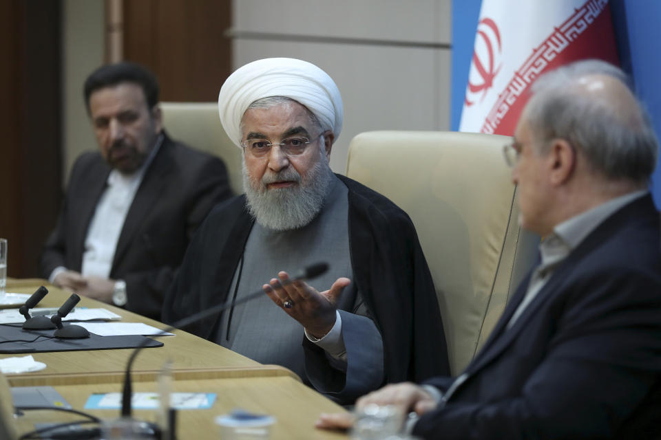 In this photo released by the official website of the office of the Iranian Presidency, President Hassan Rouhani speaks in a meeting with the Health Ministry officials, in Tehran, Iran, Tuesday, June 25, 2019. Iran on Tuesday sharply criticized new U.S. sanctions targeting the Islamic Republic's supreme leader and other top officials, saying the measures spell the "permanent closure" for diplomacy between the two nations. For his part, Iran's president described the White House as "afflicted by mental retardation." (Iranian Presidency Office via AP)