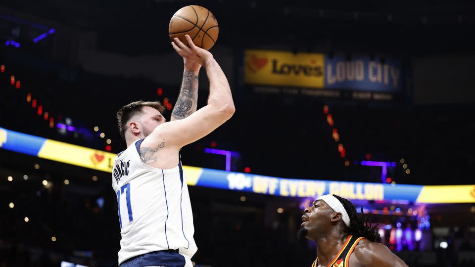 Dončić shoots a three-pointer during Game 5 against the Thunder. - Alonzo Adams/USA TODAY Sports/Reuters