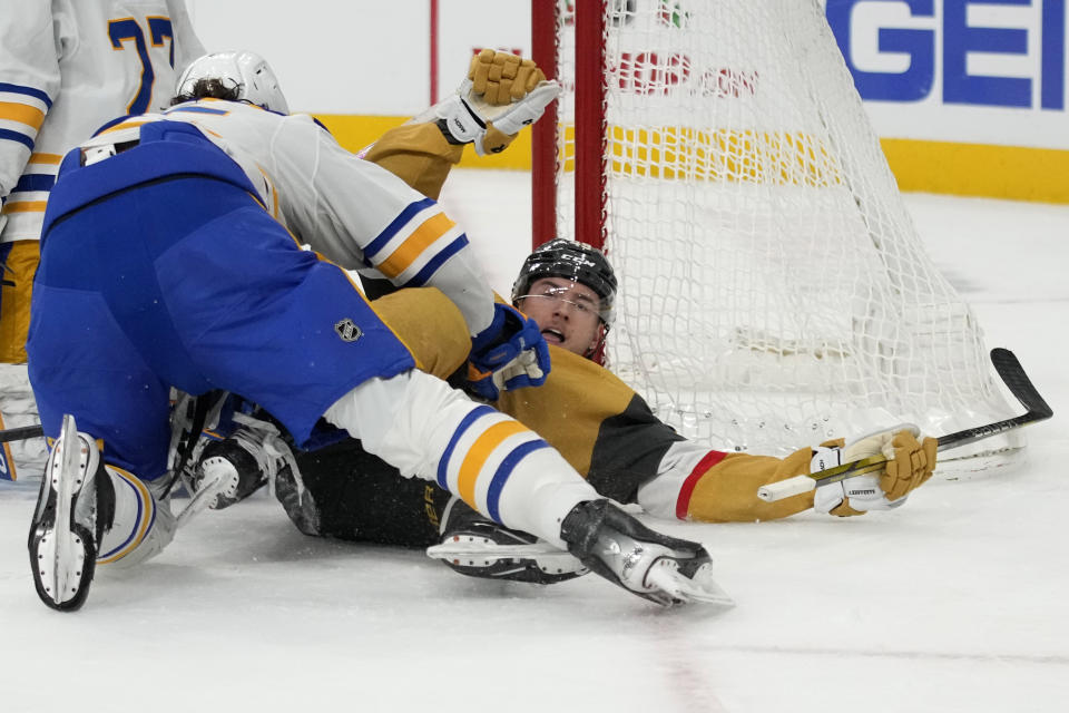 Vegas Golden Knights center Ivan Barbashev (49) celebrates after scoring against the Buffalo Sabres during the second period of an NHL hockey game Friday, Dec. 15, 2023, in Las Vegas. (AP Photo/John Locher)