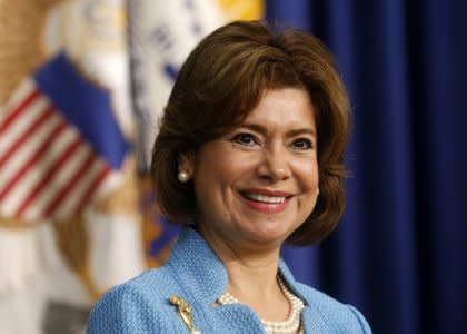 Maria Contreras-Sweet listens to remarks during her ceremonial swearing-in as Administrator of the Small Business Administration at the White House in Washington April 7, 2014. REUTERS/Kevin Lamarque