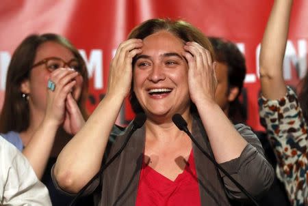 Ada Colau, leader and local candidate of "Barcelona en Comu" party, reacts as she celebrates her victory after the regional and municipal elections in Barcelona,Spain, May 24, 2015. REUTERS/Albert Gea