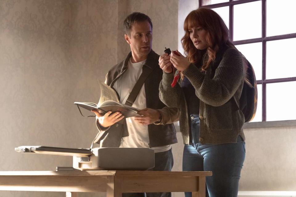 <p>Universal Pictures</p> Sam Rockwell (left) and Bryce Dallas Howard in 