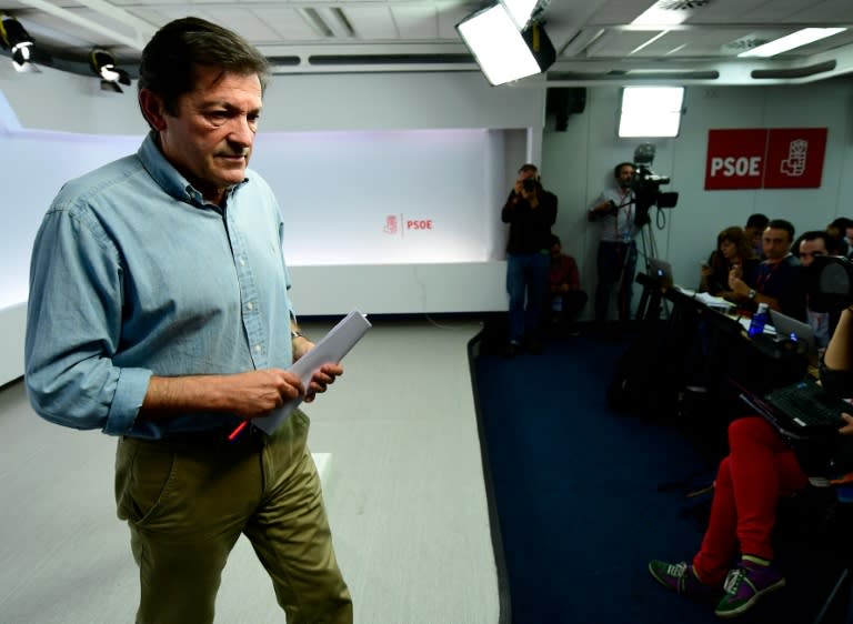 President of the Management Committee of the Spanish Socialist Party (PSOE) Javier Fernandez leaves after giving a press conference following an extraordinary meeting of the PSOE Federal Committee in Madrid, on October 23, 2016