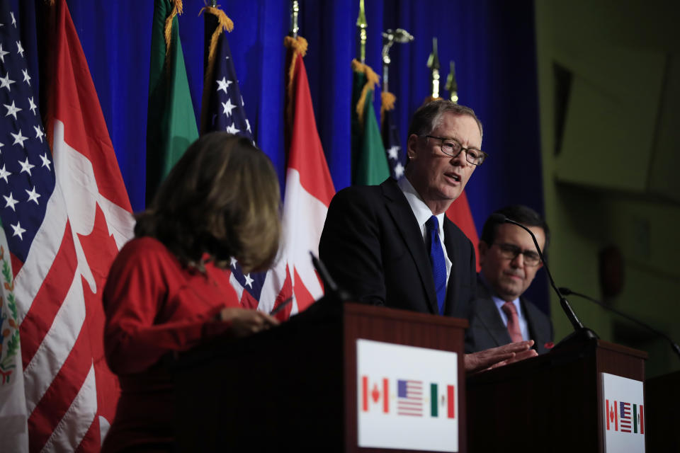 FILE- In this Oct. 17, 2017, file photo, U.S. Trade Representative Robert Lighthizer, center, with Canadian Minister of Foreign Affairs Chrystia Freeland, left, and Mexico's Secretary of Economy Ildefonso Guajardo Villarreal, right, speaks during the conclusion of the fourth round of negotiations for a new North American Free Trade Agreement (NAFTA) in Washington. U.S. and Canadian negotiators are working long hours to keep Canada in a North American trade bloc. Freeland resumed talks Wednesday, Sept. 19, 2018, with Lighthizer. (AP Photo/Manuel Balce Ceneta, File)