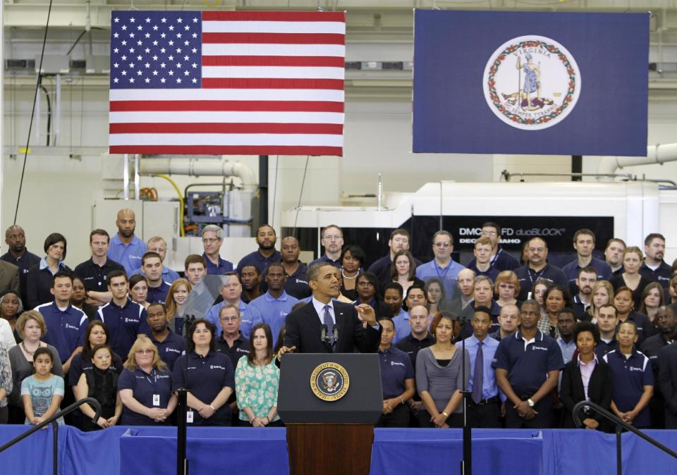 President Barack Obama gestures during a speech on the economy, Friday, March 9, 2012, at the Rolls Royce aircraft engine part production plant in Prince George, Va. (AP Photo/Steve Helber)