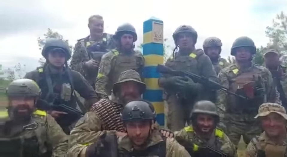 Ukrainian troops stand at the Ukraine-Russia border in what was said to be the Kharkiv region. (Reuters) 