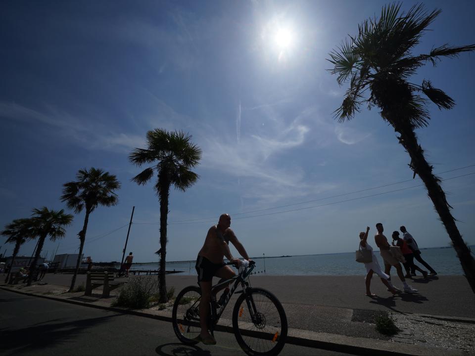 People walk and cycle along the promenade at Southend-on-Sea (PA)