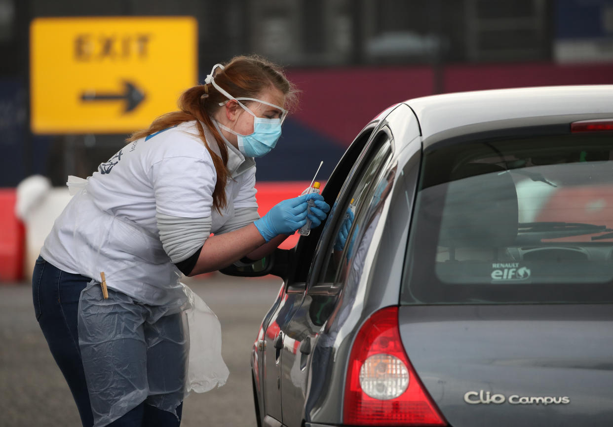 A test sample is taken at a Covid-19 testing centre at Glasgow Airport, as the UK continues in lockdown to help curb the spread of the coronavirus.