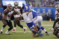 <p>New York Giants’ Corey Coleman, center, is upended during the second half of an NFL football game against the Tampa Bay Buccaneers, Sunday, Nov. 18, 2018, in East Rutherford, N.J. (AP Photo/Julio Cortez) </p>