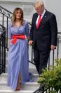 <p>For Independence Day, Melania wore a blue and white gingham evening <a href="https://www.modaoperandi.com/ralph-lauren-pf18/rivera-gingham-evening-dress" rel="nofollow noopener" target="_blank" data-ylk="slk:dress by Ralph Lauren;elm:context_link;itc:0;sec:content-canvas" class="link ">dress by Ralph Lauren</a>. She paired it with a red leather bow-tie belt <a href="https://www.matchesfashion.com/products/1184980" rel="nofollow noopener" target="_blank" data-ylk="slk:by Alexander McQueen;elm:context_link;itc:0;sec:content-canvas" class="link ">by Alexander McQueen</a> to make her outfit even more festive for the occasion. </p>