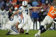 Indianapolis Colts place kicker Chase McLaughlin (7) kicks a field goal in overtime during an NFL football game against the Denver Broncos, Thursday, Oct. 6, 2022, in Denver. (AP Photo/Jack Dempsey)
