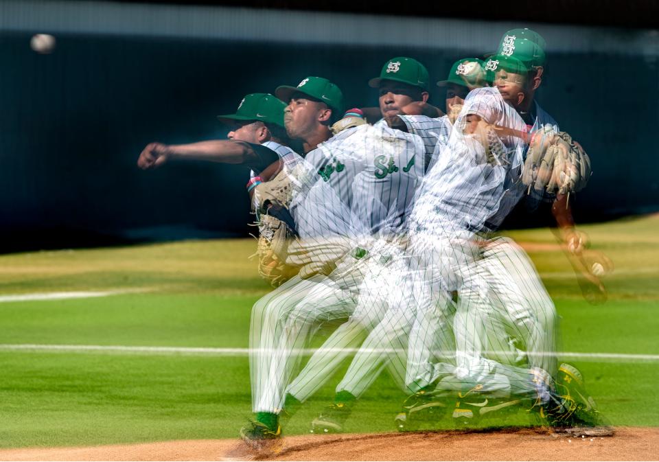 St. Mary's Michael Quedens's form is captured in a multiple exposure image as he delivers a pitch during a varsity baseball game against Lincoln at St. Mary's in Stockton on May 3, 2023.