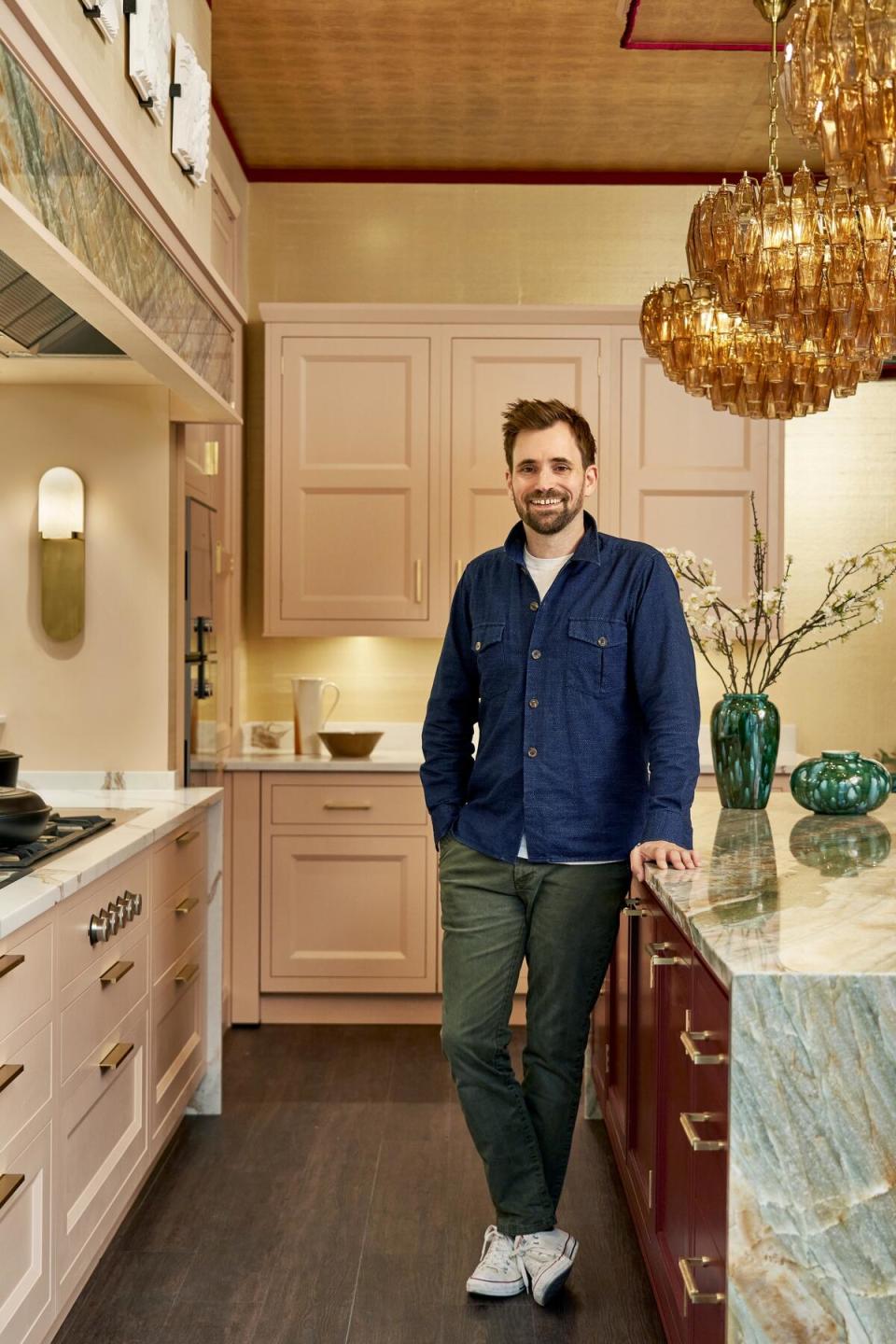 Aglow with pinks, greens and golds, Henry Prideaux’s glittering kitchen boasts many covetable features, prime among them a sequin-trimmed walk-in cocktail cabinet 