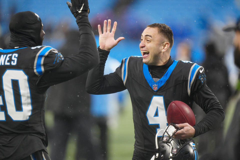 Carolina Panthers place-kicker Eddy Pineiro (4) celebrates after kicking the game winning field goal against the Atlanta Falcons during an NFL football game Sunday, Dec. 17, 2023, in Charlotte, N.C. (AP Photo/Jacob Kupferman)