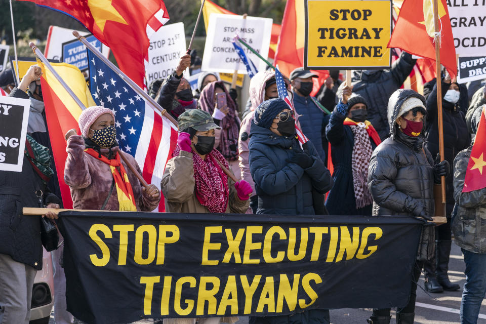 FILE - Members of the Tigray diaspora in North America protest about their conflict with Ethiopia, near the State Department in Washington on Wednesday, Dec. 22, 2021. A war in Ethiopia erupted in November 2020 when a disagreement between Prime Minister Abiy Ahmed and Tigray leaders broke out into violence after a dispute over elections. (AP Photo/Alex Brandon, File)