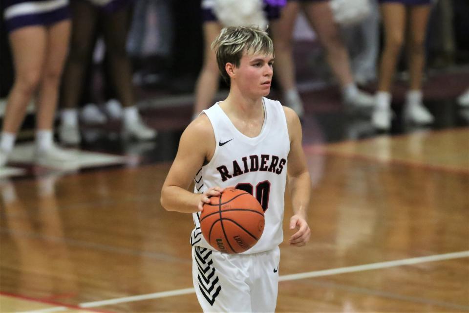 Wapahani boys basketball's Isaac Andrews brings the ball up against Muncie Central at Wapahani High School on Tuesday, Nov. 22, 2022.