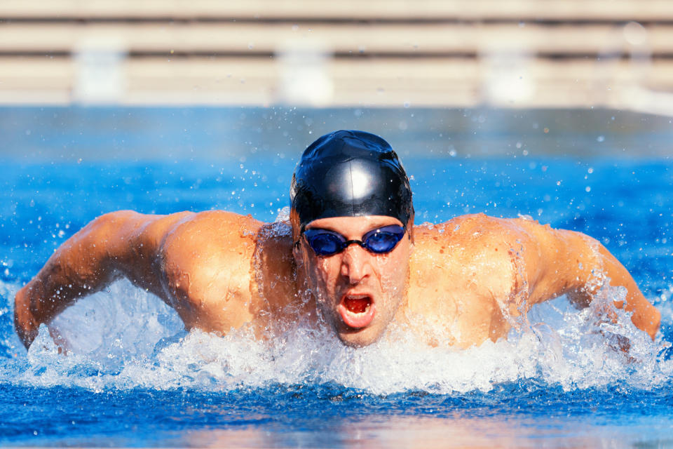 Pictured: professional swimmer swimming the butterfly. Image: Getty