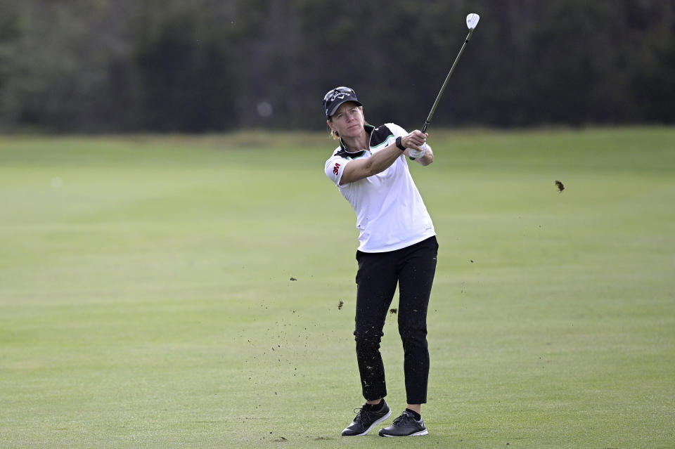 Annika Sorenstam, of Sweden, watches after hitting from the 14th fairway during the first round of the PNC Championship golf tournament, Saturday, Dec. 19, 2020, in Orlando, Fla. Sorenstam is thinking of returning to limited competition next year in the U.S. Senior Women's Open. (AP Photo/Phelan M. Ebenhack)