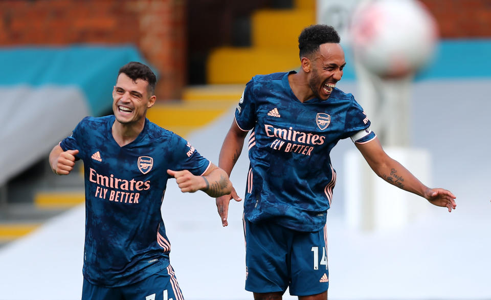 Pierre-Emerick Aubameyang celebrates scoring Arsenal's third goalPA