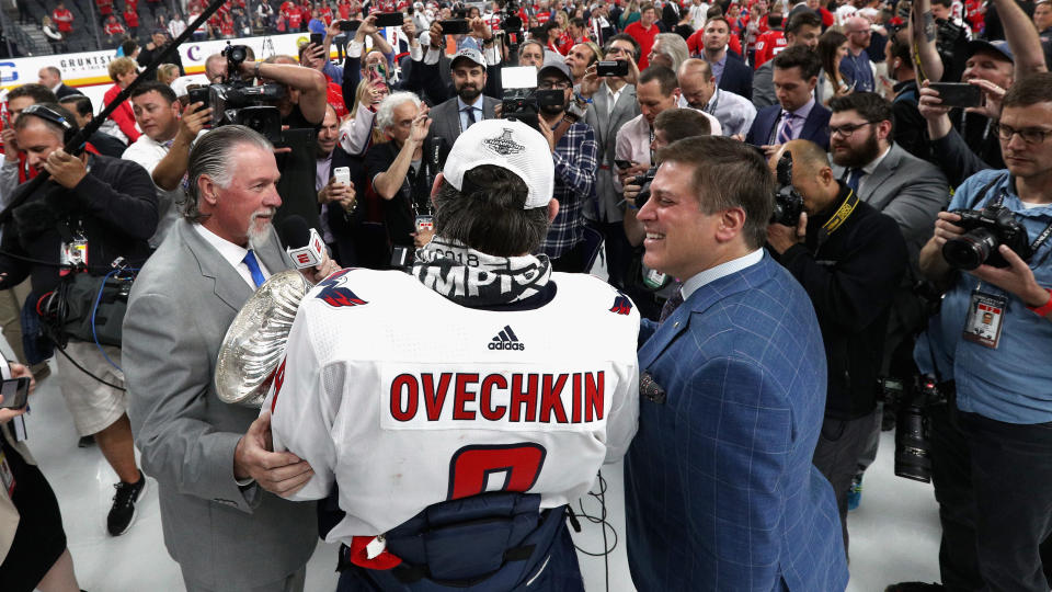 LAS VEGAS, NV - JUNE 07:  Alex Ovechkin #8 of the Washington Capitals is interviewed on the ice by Barry Melrose (L) and Steve Levy from ESPN (R) after the Capitals defeated the Vegas Golden Knights 4-3 in Game Five of the 2018 NHL Stanley Cup Final at T-Mobile Arena on June 7, 2018 in Las Vegas, Nevada. The Capitals won the series four games to one.  (Photo by Dave Sandford/NHLI via Getty Images)