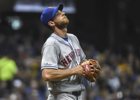 FILE PHOTO: May 3, 2019; Milwaukee, WI, USA; New York Mets pitcher Steven Matz (32) reacts after giving up a hit in the fifth inning against the Milwaukee Brewers at Miller Park. Mandatory Credit: Benny Sieu-USA TODAY Sports