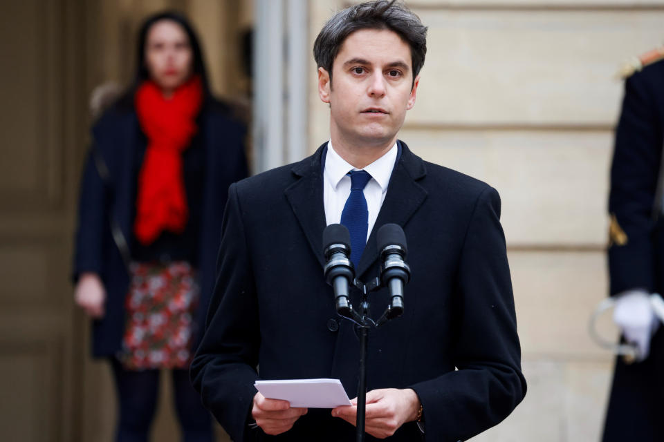 FILE - Gabriel Attal delivers his speech after the handover ceremony, Tuesday, Jan. 9, 2024 in Paris. French President Emmanuel Macron's choice to appoints a 34-year-old prime minister surprised many _ because of his young age and relatively short career. But Gabriel Attal has become in recent years one of the most prominent and ambitious figures on the French political scene, considering there's "nothing greatest than serving France." (Ludovic Marin, Pool via AP, File)