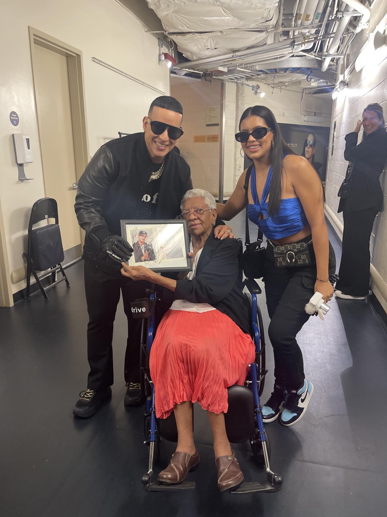 Daddy Yankee, Mami Flor with her signed photo and Ivanna backstage. (Courtesy of Ivanna Michelle)