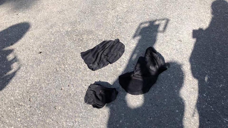 Ski masks lay on the ground outside the residence of President Jovenel Moïse who was assassinated on Wednesday, July 7, 2021.