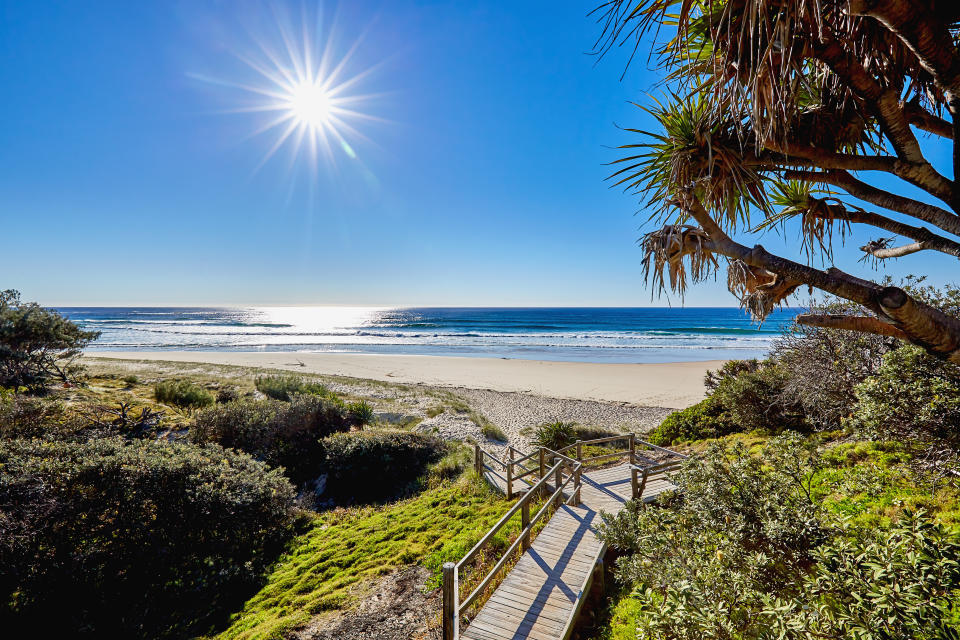 Wooden stairs leading down to Frenchman's beach at Point Lookout,North Stradbroke Island,Queensland,Australia