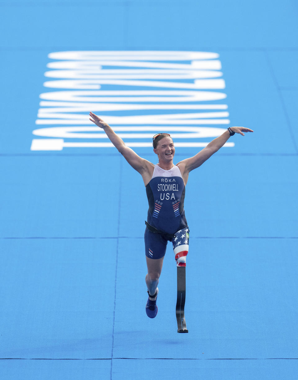 Melissa Stockwell, of the UnitesStates, approaches the finish line in the women's triathlon PTS2 at Odaiba Marine Park during the Tokyo 2020 Paralympic Games on Saturday, Aug. 28, 2021, in Tokyo. (Joe Toth for OIS via AP)