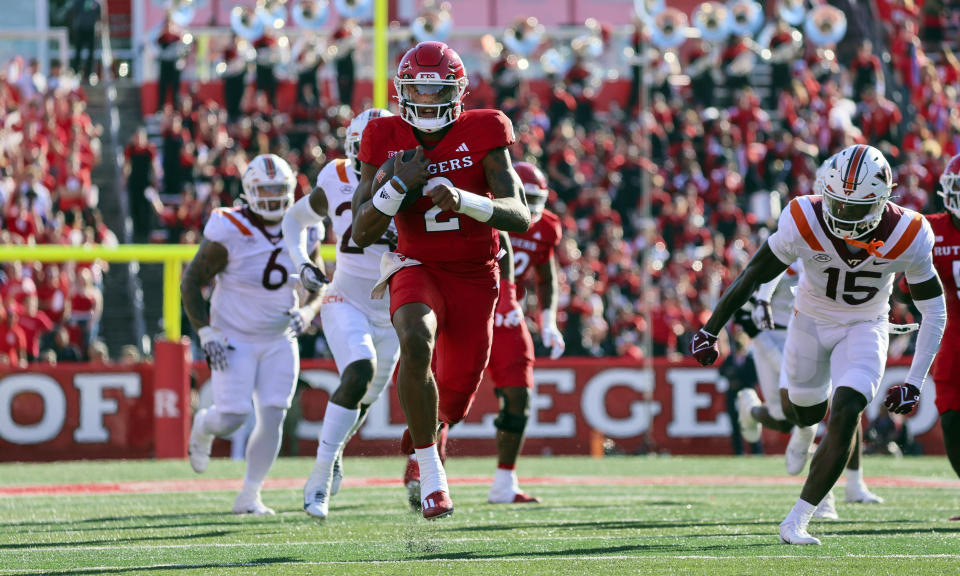 Rutgers quarterback Gavin Wimsatt (2) carries the ball through the Virginia Tech secondary for a 34-yard touchdown during the second quarter of an NCAA college football game, Saturday, Sept. 16, 2023, in Piscataway, N.J. (Andrew Mills/NJ Advance Media via AP)